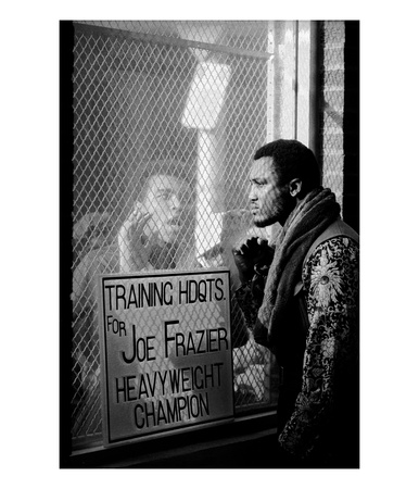 Boxer Muhammad Ali Taunting Rival Joe Frazier At Frazier's Training Headquarters by John Shearer Pricing Limited Edition Print image