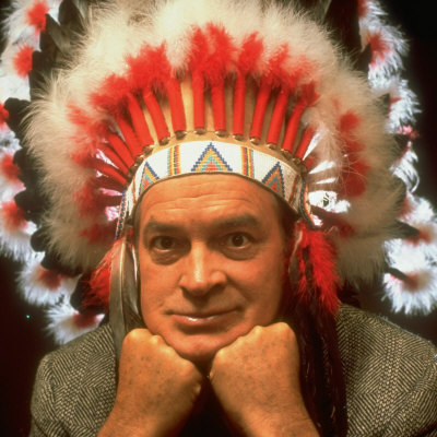 Comedian Bob Hope Posing In Indian Headdress Given Him By Ok State Univ. Women by Allan Grant Pricing Limited Edition Print image