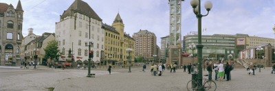 Tourists At A Town Square, Jernbanetorget, Oslo, Norway by Panoramic Images Pricing Limited Edition Print image