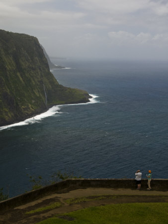Tourists Photographing The Cliffs Over Waipi'o Valley by Todd Gipstein Pricing Limited Edition Print image