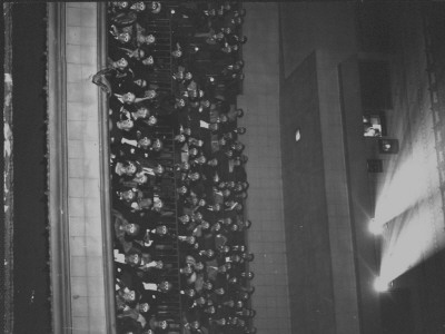 Formally Attired Audience Wearing 3-D Glasses At Opening Night Of Bwana Devil, Paramount Theater by J. R. Eyerman Pricing Limited Edition Print image