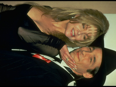 Actress Lisa Hartman Affectionately Touching Face Of Country/Western Singer Husband Clint Black by Kevin Winter Pricing Limited Edition Print image