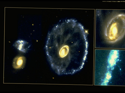 Cartwheel Galaxy And A Smaller, Both Surrounded With Rings Of Bright Blue Stars by Kirk Borne Pricing Limited Edition Print image