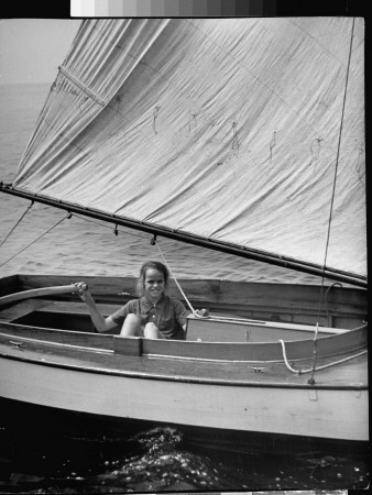 A Little Girl Sailing In A Boat Off The Coast Of Maine by Peter Stackpole Pricing Limited Edition Print image
