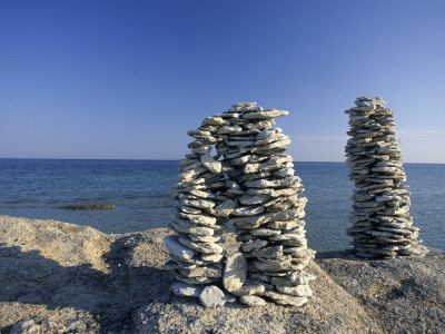 Close-Up Of Stacks Of Stones On The Beach by Anders Tukler Pricing Limited Edition Print image