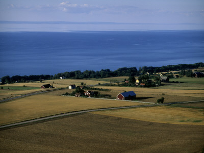 View Of A Village On The Shore Of Lake V?Ttern, Sweden by Lars Astrom Pricing Limited Edition Print image