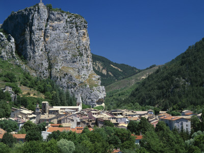 Castlelane, Provence, Village In Dramatic Landscape At The Foot Of Rocky Cliff Face by Joe Cornish Pricing Limited Edition Print image