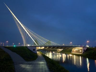 Three Bridges Over The River Hoofdvaart, Hoofddorp, One Of The Bridges At Dusk, Santiago Calatrava by Ralph Richter Pricing Limited Edition Print image