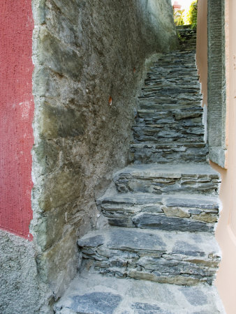 A Narrow Stone Walkway In Manarola, Cinque Terre, Italy by Dennis Flaherty Pricing Limited Edition Print image