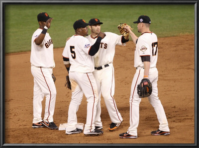 Texas Rangers V San Francisco Giants, Game 2: Edgar Renteria, Juan Uribe, Freddy Sanchez, Aubrey Hu by Ezra Shaw Pricing Limited Edition Print image