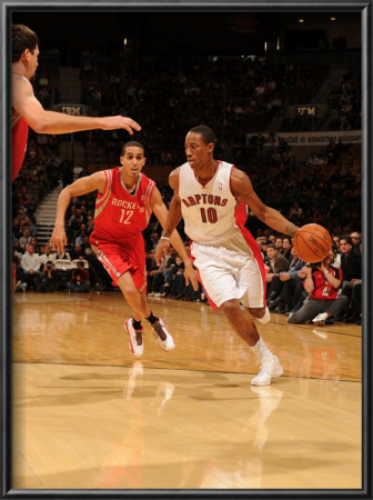 Houston Rockets V Toronto Raptors: Demar Derozan And Kevin Martin by Ron Turenne Pricing Limited Edition Print image