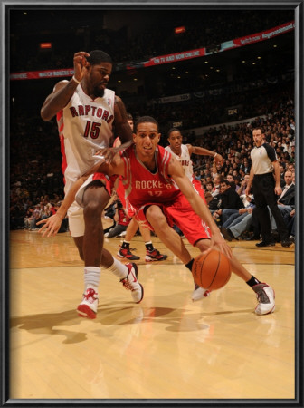 Houston Rockets V Toronto Raptors: Kevin Martin And Amir Johnson by Ron Turenne Pricing Limited Edition Print image