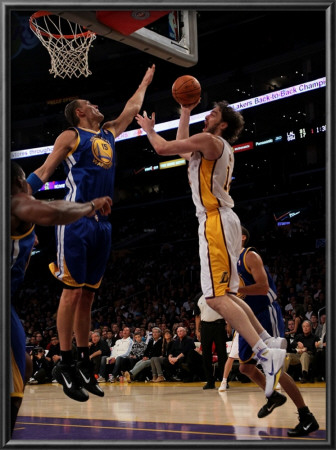 Golden State Warriors V Los Angeles Lakers: Pau Gasol And Andris Biedrins by Stephen Dunn Pricing Limited Edition Print image