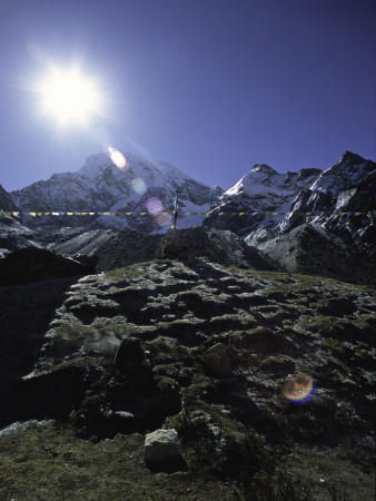 Sun Shines Over Flags, Nepal by David D'angelo Pricing Limited Edition Print image