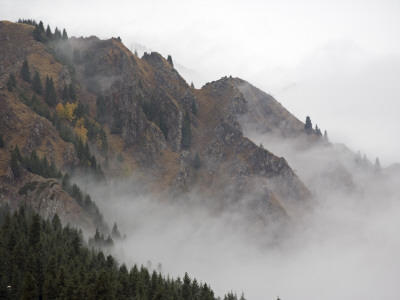Mist Shrouds The Tian Shan In Xinjiang Province, North-West China. September 2006 by George Chan Pricing Limited Edition Print image