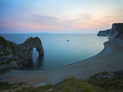 Twilight On The Cliff Tops Above Durdle Door, Dorset, England. Jurassic Coast World Heritage Site by Adam Burton Pricing Limited Edition Print image