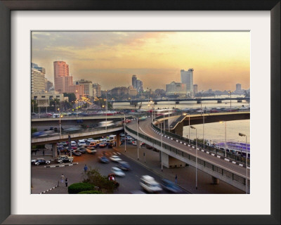 A Traffic Jam At Sunset On One Of Cairo's Bridges Spanning The Nile River, Egypt, May 20, 2001 by Enric Marti Pricing Limited Edition Print image
