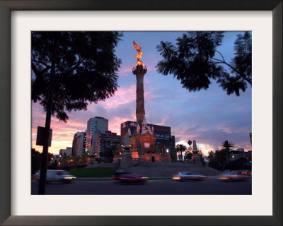 Traffic Passes By The Angel Of Independence Monument In The Heart Of Mexico City by John Moore Pricing Limited Edition Print image