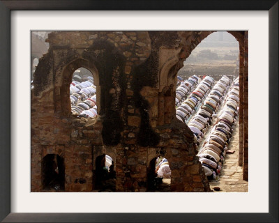 Muslims Offer Eid Prayers At The Ruins Of Jami Mosque, Which Was Built In 1345 Ad by Manish Swarup Pricing Limited Edition Print image
