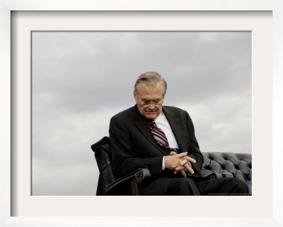 Outgoing Secretary Of Defense Donald Rumsfeld Looks Down As He Sits On Stage by Pablo Martinez Monsivais Pricing Limited Edition Print image