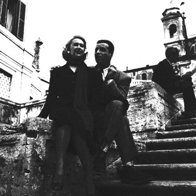 Martine Carol With Christian-Jaque On The Steps Of The Trinite Des Monts Church In Rome by Benno Graziani Pricing Limited Edition Print image