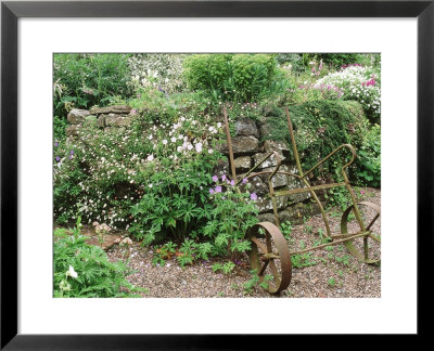 Retaining Wall Decorative Old Wheelbarrow Frame Glebe Cottage, Devon by Mark Bolton Pricing Limited Edition Print image
