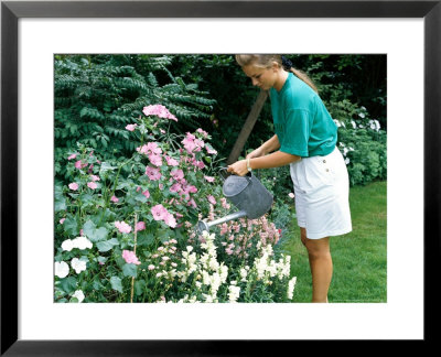Woman Taking Weed Out Of Pond Using Rake Lythrum by Jane Legate Pricing Limited Edition Print image