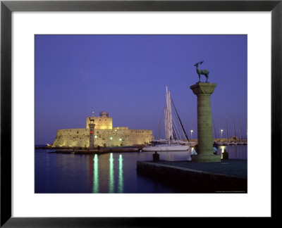 Entrance To Mandraki Harbour At Dusk, Greece by Ian West Pricing Limited Edition Print image