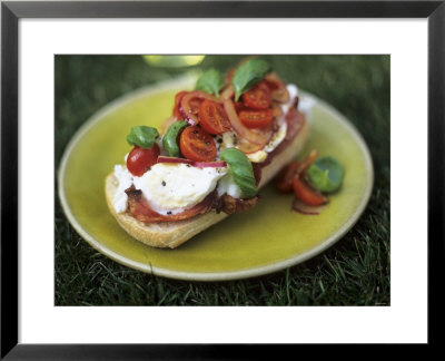 Bruschetta With Cherry Tomatoes And Mozzarella In A Meadow by David Loftus Pricing Limited Edition Print image