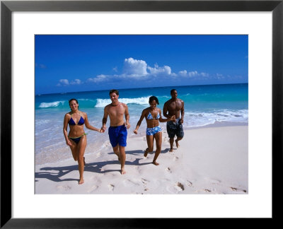Happy Couples At Natural Arches Beach In Bermuda by Lee Foster Pricing Limited Edition Print image