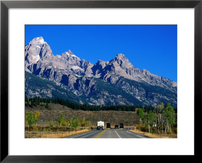 Vehicles At National Park Entrance, With Mountains Beyond, Grand Teton National Park, Wyoming by Holger Leue Pricing Limited Edition Print image