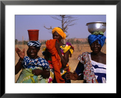 Colourfully Attired Local Women Collecting Water In The Mopti Region, Mali by Patrick Syder Pricing Limited Edition Print image
