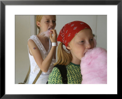 Tivoli, Two Sisters Eat Cotton Candy At The Park, Copenhagen, Denmark by Brimberg & Coulson Pricing Limited Edition Print image