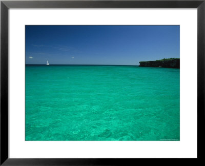Sailboat In Crystal Clear Blue Water Off The Coast Of Cuba by Steve Winter Pricing Limited Edition Print image