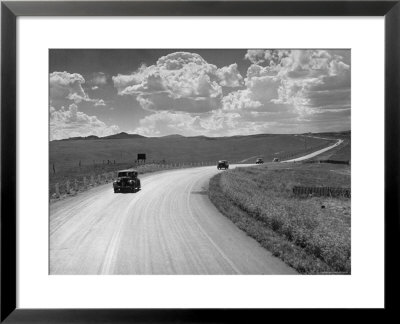 Car Driving From Omaha Nebraska To Salt Lake City Utah On Highway 30 by Allan Grant Pricing Limited Edition Print image
