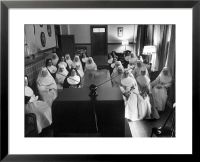Sisters At St. Vincent's Hospital In Recreation Room Watching Program From New Local Tv Station by Ralph Morse Pricing Limited Edition Print image