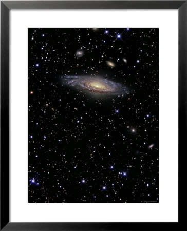 Ngc 7331 Is A Spiral Galaxy In The Constellation Pegasus by Stocktrek Images Pricing Limited Edition Print image