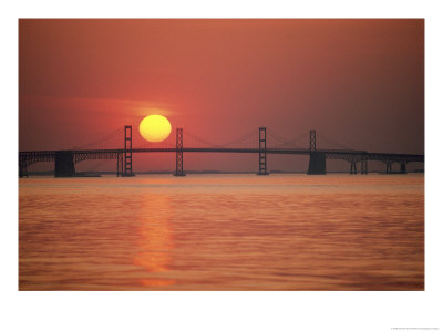 View From The Water Of The Chesapeake Bay Bridge And The Setting Sun by Kenneth Garrett Pricing Limited Edition Print image