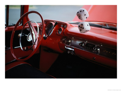 Fuzzy Dice And Cherry Red Interior Of A Classic Car by Stephen St. John Pricing Limited Edition Print image
