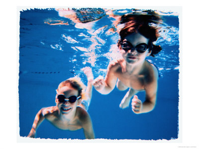 Boy And Girl Wearing Goggles Underwater by Chris Briscoe Pricing Limited Edition Print image