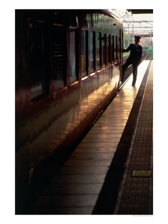 Conductor Outside Train, Kyoto, Japan by Kindra Clineff Pricing Limited Edition Print image