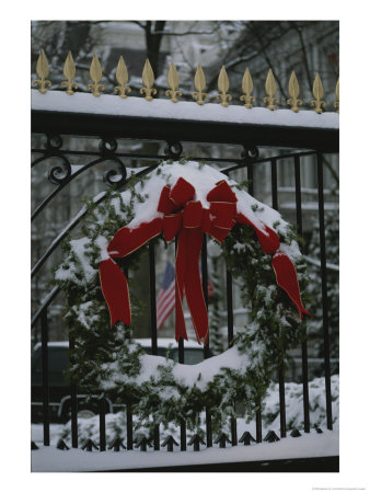 Fresh Snow Covers A Christmas Wreath On The White House Gate by Stephen St. John Pricing Limited Edition Print image