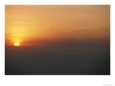 Sun Sets Over Mount Kilimanjaro, Seen From Ol Doinyo Lengai Volcano by Peter Carsten Pricing Limited Edition Print image