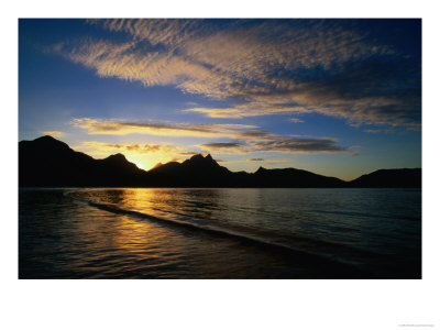 Sunset Over Water And Mountains Near Thorsborne Trail, Little Ramsay Bay, Australia by Will Salter Pricing Limited Edition Print image