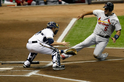 Cardinals V Milwaukee Brewers - G. Six, Milwaukee, Wi - Oct. 16: Albert Pujols And Jonathan Lucroy by Scott Boehm Pricing Limited Edition Print image