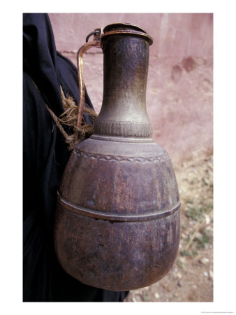 Copper Water Jug Is Carried From Well To Homes, Morocco by John & Lisa Merrill Pricing Limited Edition Print image