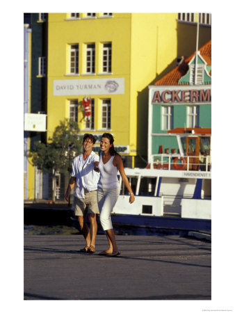 Couple At The Willemstad Waterfront, Curacao, Caribbean by Greg Johnston Pricing Limited Edition Print image