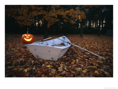 An Illuminated Jack-O-Lantern On The Back Of A Rowboat by Bill Curtsinger Pricing Limited Edition Print image