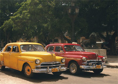 Yellow Car And Orange Taxi by Nelson Figueredo Pricing Limited Edition Print image
