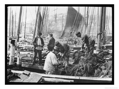 Fishermen Overhaul The Nets On Their Boats At Scarborough Yorkshire by Graystone Bird Pricing Limited Edition Print image